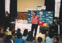 JoAnn speaking with school-age children about the importance of emgergency prepardedness.